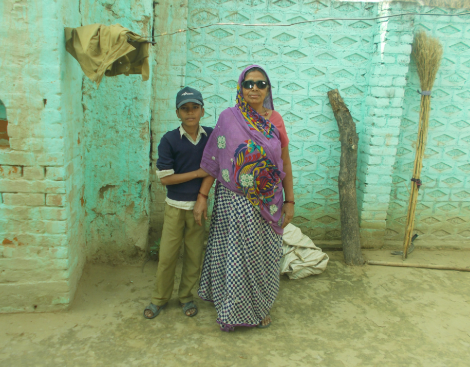 Blind Indian grandmother with her grandson.